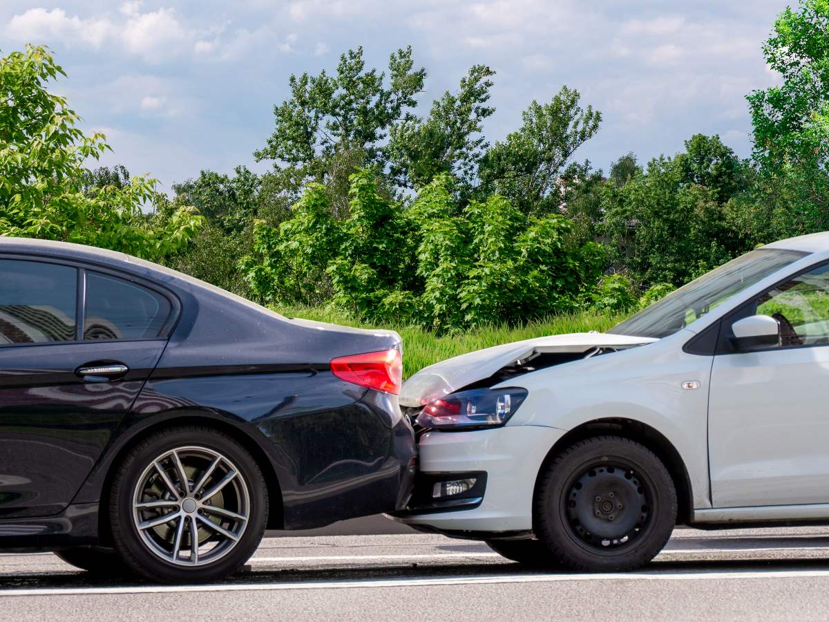 two crashed vehicles affected by Texas car accident laws